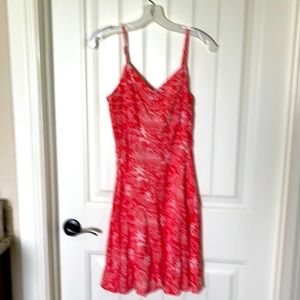 Fun spaghetti strap dress coral print color with hidden zipper. Comfortable,cute